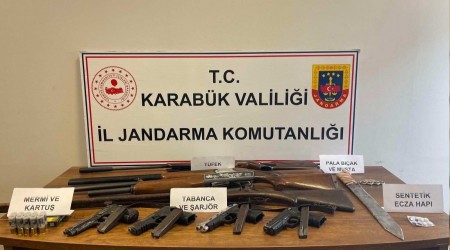 Karabk'te adli aramada ok sayda silah ele geirildi