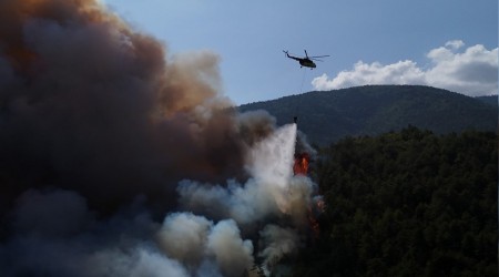 4 saattir devam eden orman yangnna havadan ve karadan mdahale sryor
